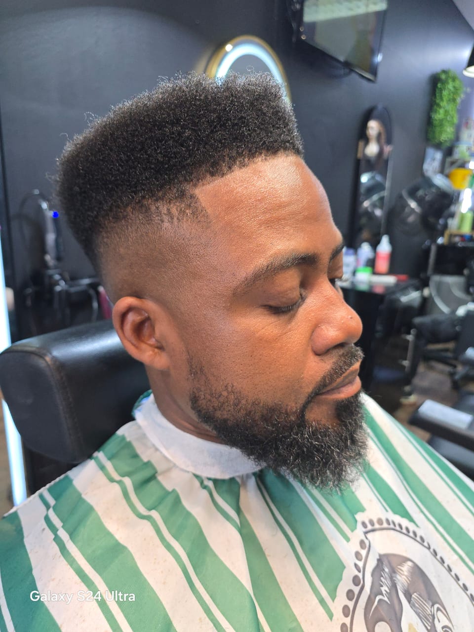 High top fade with sharp beard line
