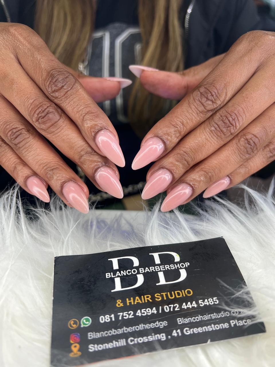 Nude glossy almond nails