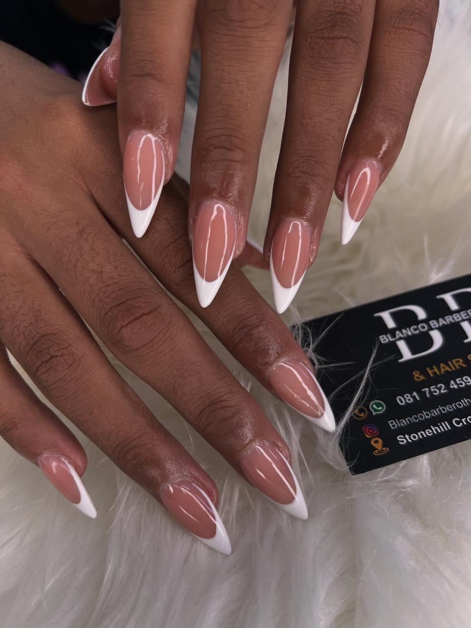 Classic white French tip almond nails