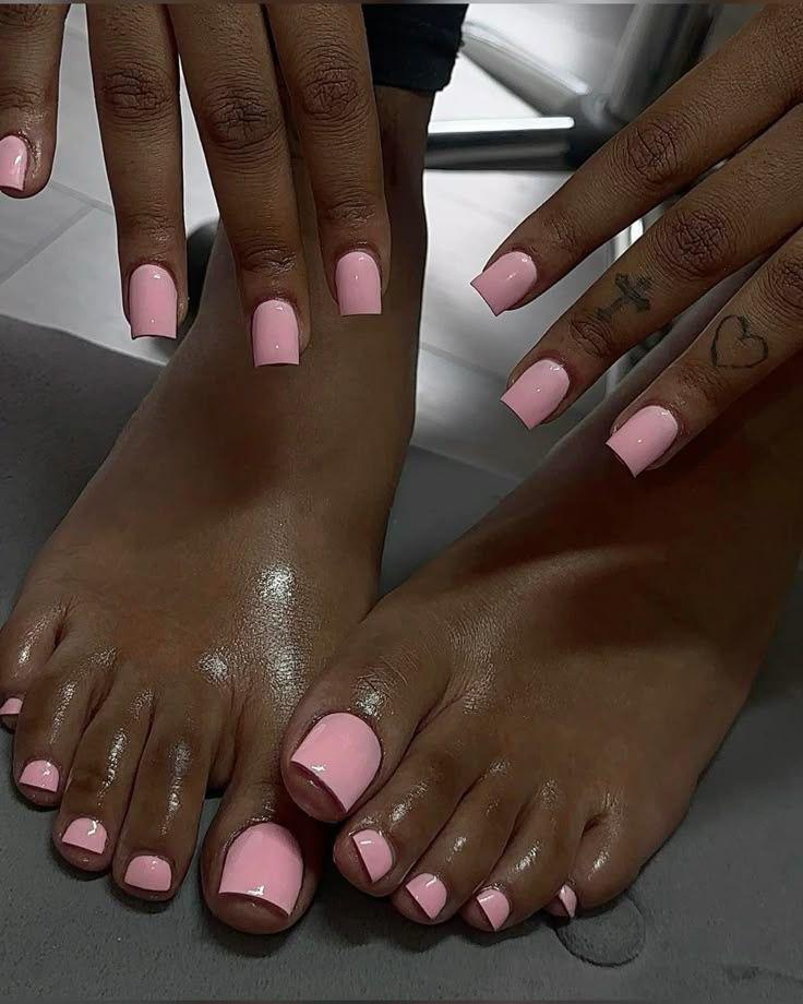 Matching pink manicure and pedicure