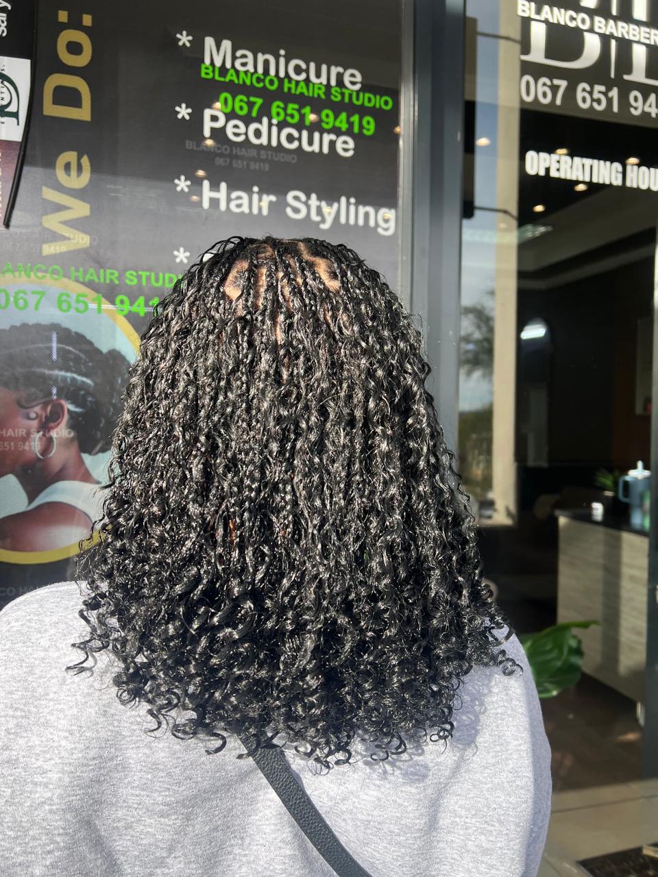 Curly shoulder length braids